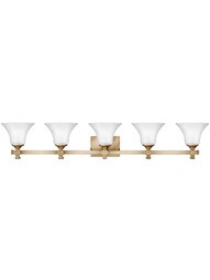 Abbie 5-Light Bath Sconce in Brushed Caramel.